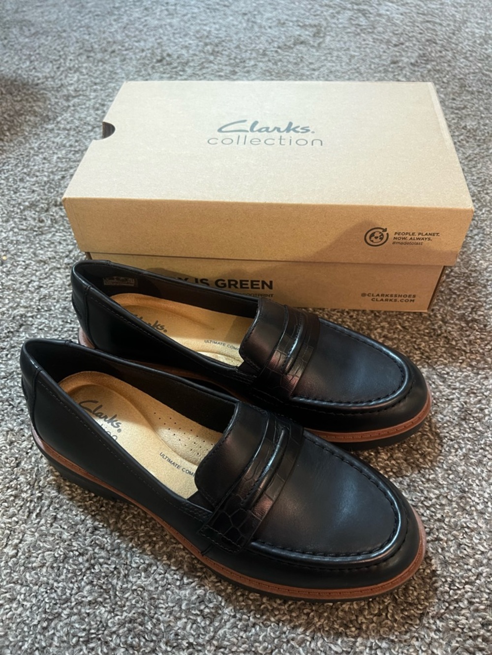 Clarks Black Leather Penny Loafers with Tan Trim